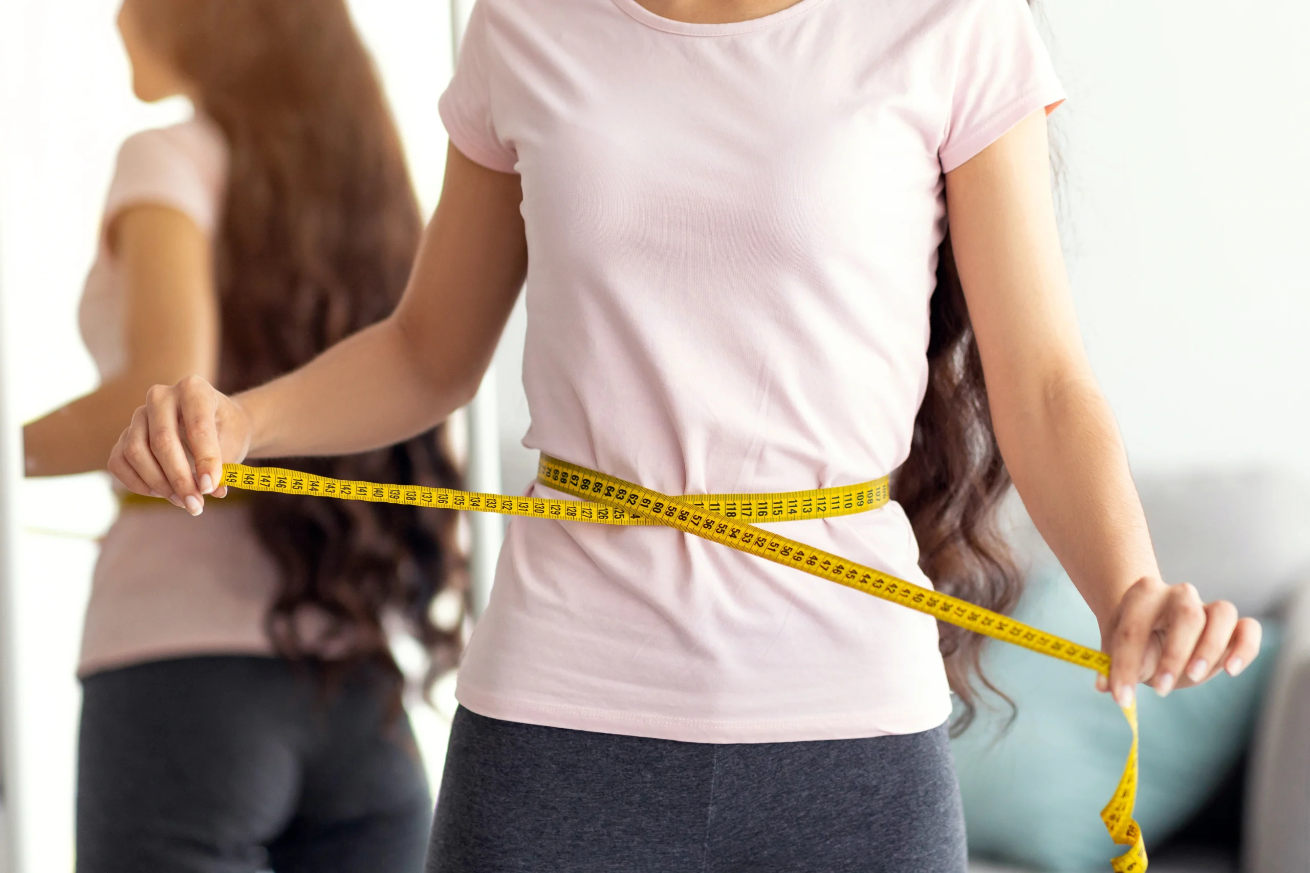 unrecognizable-indian-lady-measuring-her-waist-wit-2025-03-18-17-00-31-utc